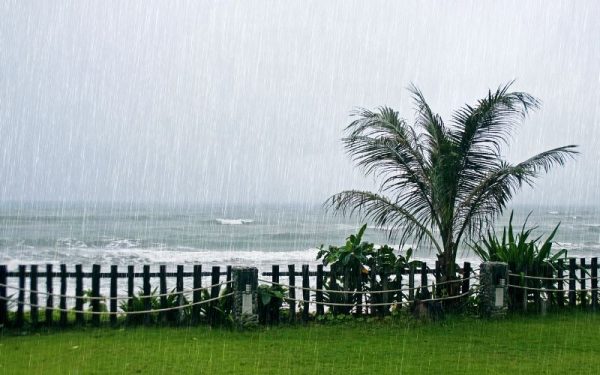 Heavy rain and rough seas during Gold Coast storm season.